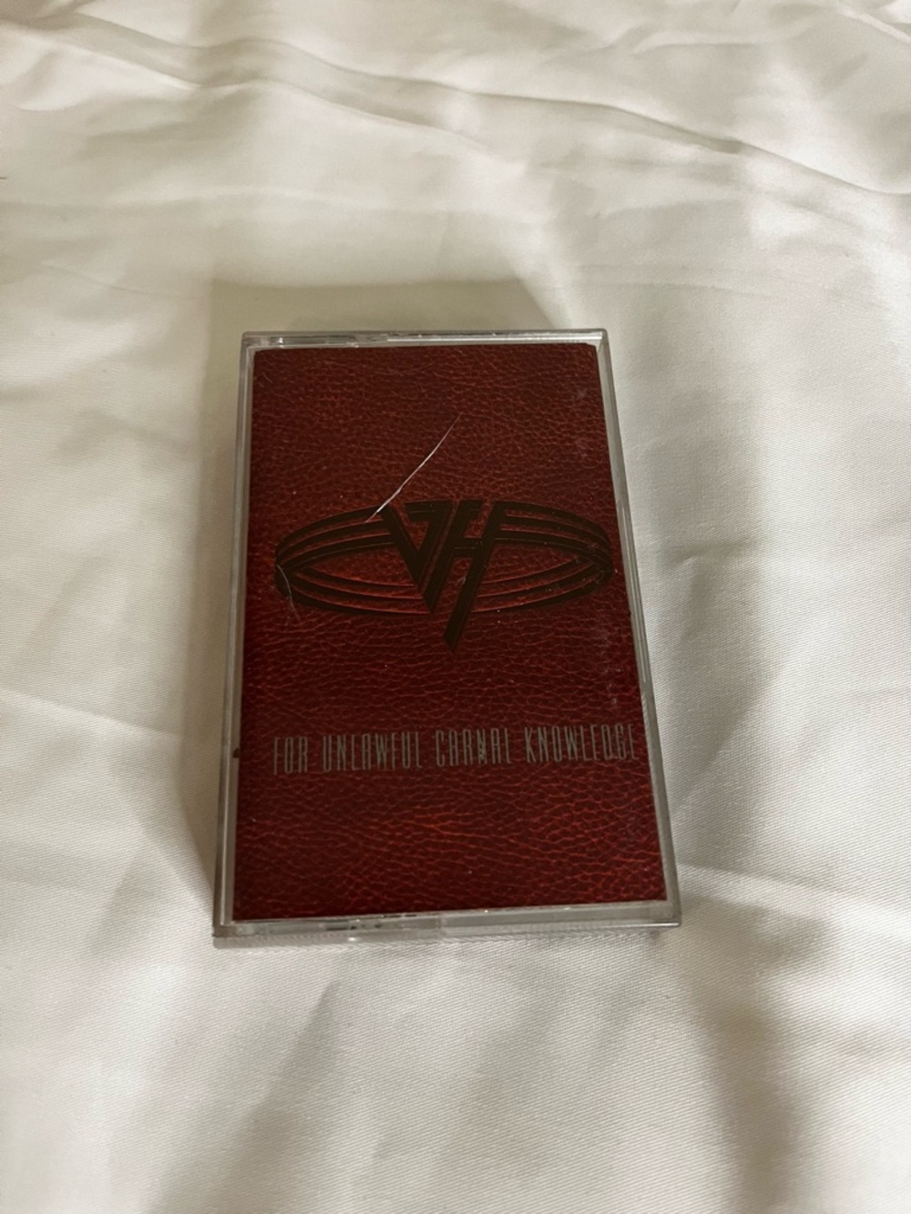 Warner Bros. Electronics Other cassette — deep red with black logo